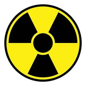 Round radiation warning sign on white background